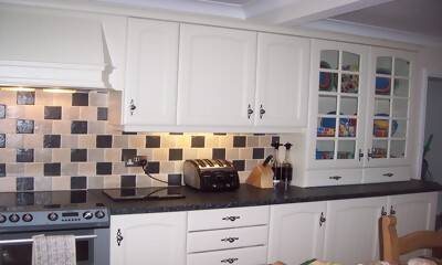 Kitchen refurbishment and repair service - damaged cupboard restoration example
